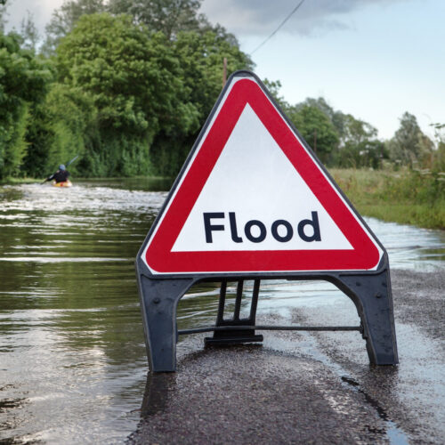 County,Road,In,Essex,Of,Flooded,Road,With,A,Person